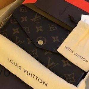 Louis Vuitton Sara Wallet Monogram